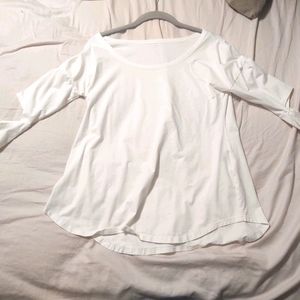 White long sleeve shirt with elbow slits